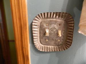 Repurposed tin candle holder